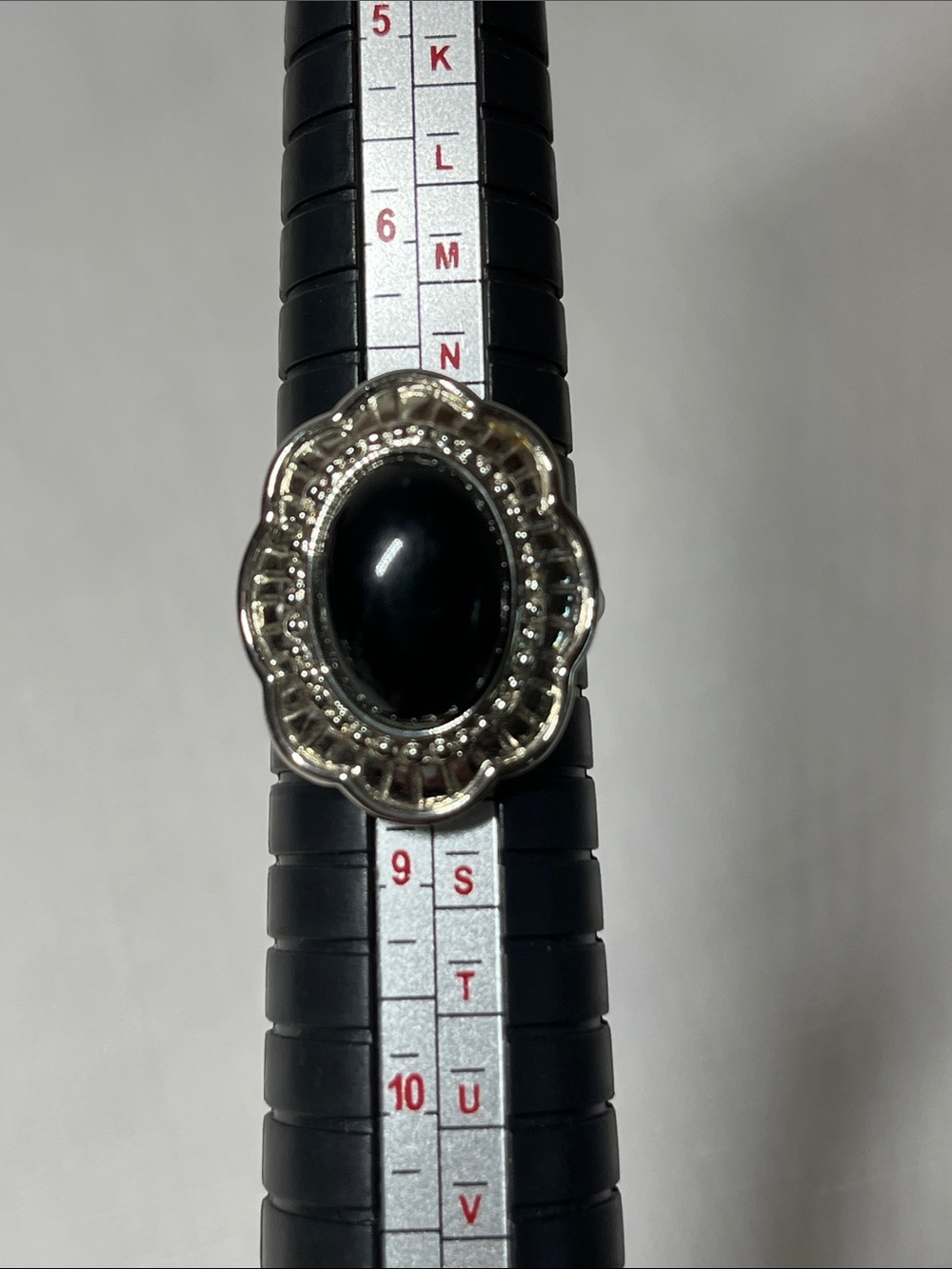 Vintage Silver Floral Frame Ring with Black Onyx Center
Size 8